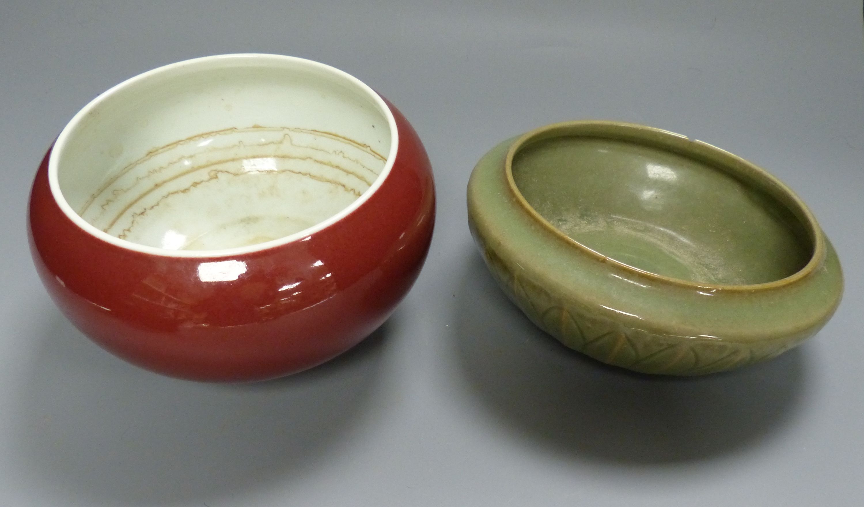 A Chinese Sang de Boeuf censer, a similar celadon glazed bowl, together with a Wedgwood black basalt teapot, c.1800 and a similar 20th